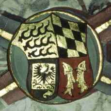 Wappen des Hauses Württemberg mit den drei Hirschstangen, den Rauten vom Herzogtum Teck, den Fischen von Mömpelgard und der Reichssturmfahne (Markgröningen)